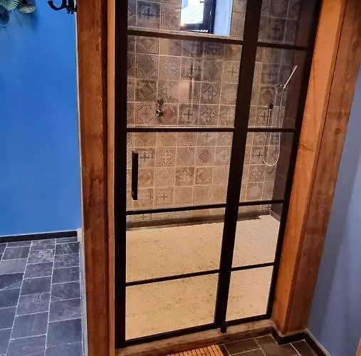 Couette-café Vleugje Wellness In De Voerstreek - Bed & Brocante Onder De Poort